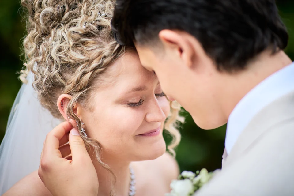 A close moment between a newly married couple