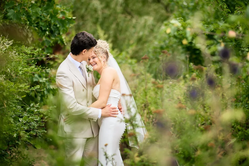 The couple sitting together in the garden